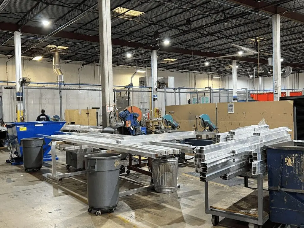 Hurricane shutter manufacturing facility producing aluminum shutters for commercial properties