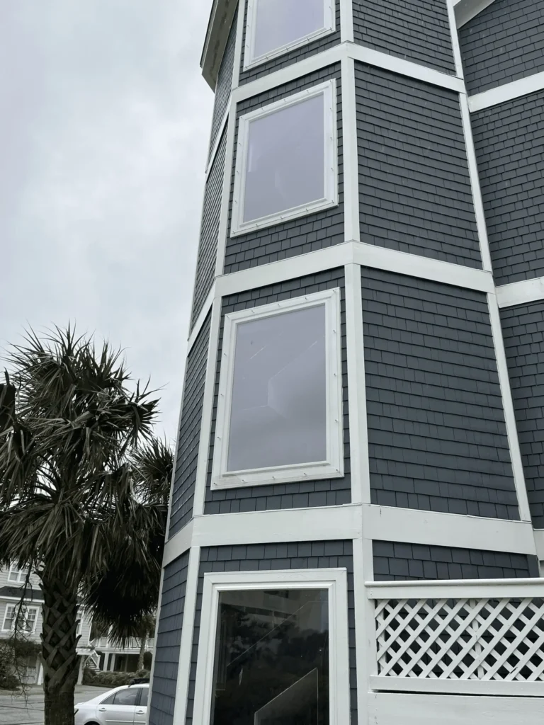 Gray shingle coastal tower home, hurricane ready.