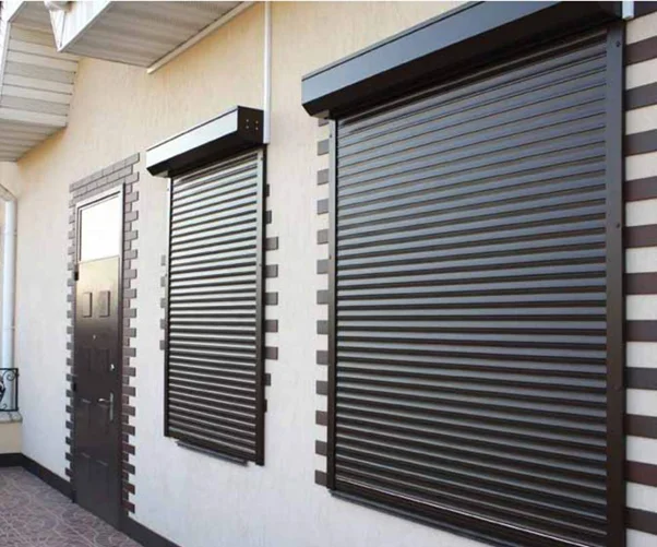 Dark brown hurricane shutters protect modern home.