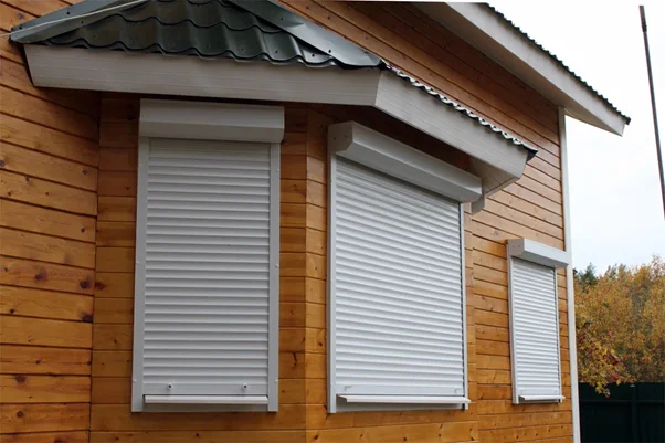White hurricane shutters: brick home protection, myrtle beach - american hurricane shutters Rolldown storm shutters Myrtle Beach