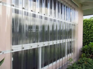Residential storm shutters: clear panels for hurricane readiness.