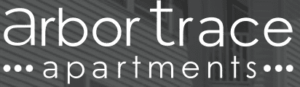 Arbor Trace Apartments logo against modern building exterior.
