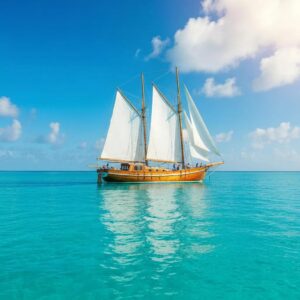 Coastal home with accordion shutters deployed against stormy sky, showcasing protection and aesthetic appeal