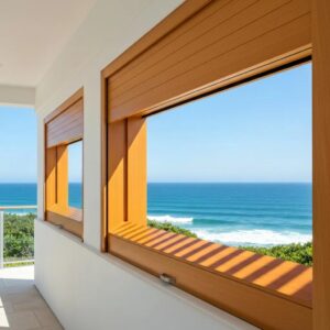 Coastal home with roll down shutters partially deployed, showcasing storm protection and aesthetic appeal
