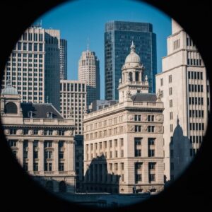 Coastal home with various hurricane shutters illustrating storm protection and aesthetic appeal