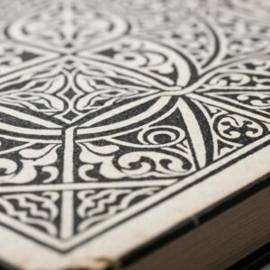 Wind-blown debris striking an improperly closed accordion shutter, showing safety risk