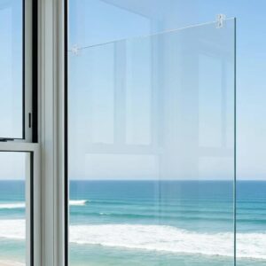 Installed polycarbonate hurricane panel that lets in daylight while resisting impact