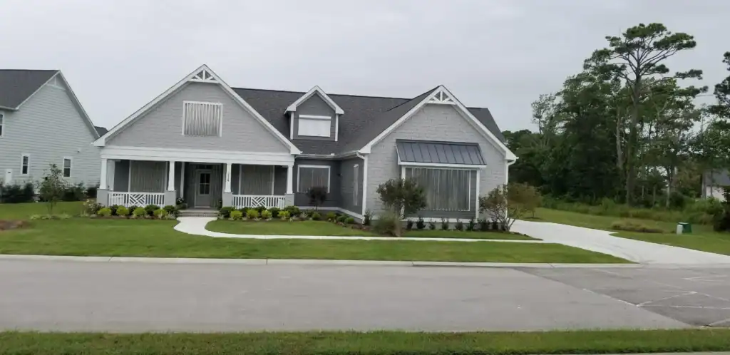 New Hanover County home featuring aluminum storm panels from AHS, providing hurricane protection for Ogden, Wilmington