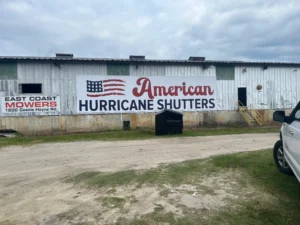 American Hurricane Shutter headquarters and installation truck fleet at 1200 Castle Hayne Road in Wilmington, NC.