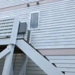 Clear Lexan polycarbonate shutters installed on a home near the Myrtle Beach Boardwalk