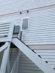 Clear Lexan polycarbonate shutters installed on a home near the Myrtle Beach Boardwalk
