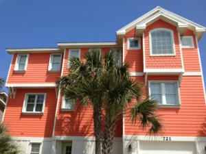 Optically clear Lexan polycarbonate shutters installed on a modern home in Wrightsville Beach NC.
