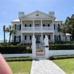Black Colonial hurricane shutters installed on a home in Brunswick Forest Leland NC.