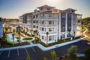 Black Colonial hurricane shutters installed on a historic senior living home in Conway SC.
