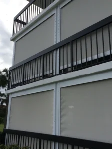 Retractable hurricane screens protecting a golf villa lanai in Barefoot Resort North Myrtle Beach.