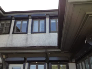 Motorized rolling storm shutters protecting a luxury oceanfront estate on Figure Eight Island NC.