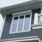 Motorized rolling storm shutters on a luxury home in Grande Dunes Myrtle Beach.