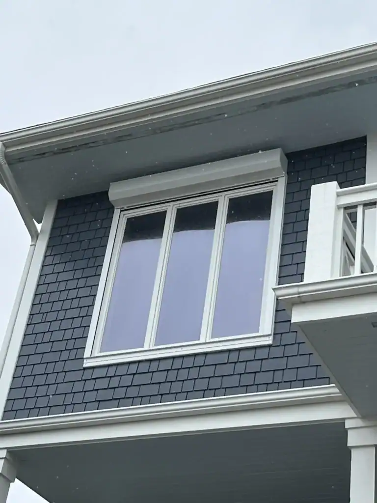 Horry County: Motorized roll-down hurricane shutters on a Grande Dunes home, offering storm protection and security for
